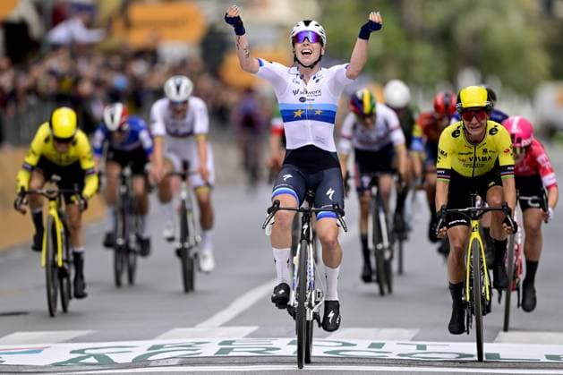 Dutch Lorena Wiebes of SD Worx-Protime (C) celebrates as she crosses the finish line, before Dutch Marianne Vos of Team Visma-Lease a Bike (R), winning the sprint at the finish of the Milano-Sanremo Donne one day cycling race for women, 156km from Milan to Sanremo, Italy, Saturday 22 March 2025. DIRKxWAEM  x115408932x