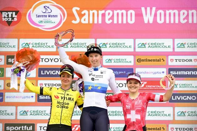 Dutch Marianne Vos of Team Visma-Lease a Bike, Dutch Lorena Wiebes of SD Worx-Protime and Swiss Noemi Ruegg of EF Education-Oatly pictured on the podium after the Milano-Sanremo Donne one day cycling race for women, 156km from Milan to Sanremo, Italy, Saturday 22 March 2025. DIRKxWAEM  x115409529x