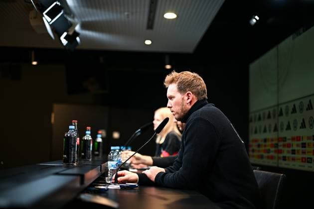Julian Nagelsmann (Deutschland, Trainer), dahinter Oliver Baumann (Deutschland, 01), GER, DFB Fussball Nationalmannschaft Herren, MD-1 Pressekonferenz vor Deutschland gegen Italien, UEFA Nations-League-Viertelfinale. GER, DFB Fussball Nationalmannschaft Herren, MD-1 Pressekonferenz vor Deutschland gegen Italien, UEFA Nations-League-Viertelfinale. Dortmund *** Julian Nagelsmann Germany, Coach , behind Oliver Baumann Germany, 01 , GER, DFB Football National Team Men, MD 1 Press Conference before Germany vs. Italy, UEFA Nations League Quarterfinals GER, DFB Football National Team Men, MD 1 Press Conference before Germany vs. Italy, UEFA Nations League Quarterfinals Dortmund Copyright: xEibner-Pressefoto FlorianxWiegandx EP_FWD