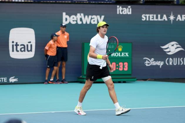 March 22, 2025, Miami Gardens, Florida, United States Of America: MIAMI GARDENS, FLORIDA - MARCH 22: Joao Fonseca of Brazil defeats Ugo Humbert of France in the second round of the men s singles at the Miami Open at the Hard Rock Stadium on March 22, 2025 in Miami Gardens, Florida. ...People: Joao Fonseca Miami Open 2025 - Day 5  - ZUMAs214 20250322_ada_s214_207 Copyright: xSMGx