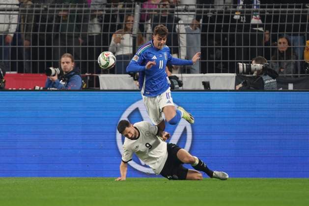 Tim Kleindienst Germany and Daniel Maldini Italy battle for the ball during the UEFA Nations League Quarterfinal Leg Two match between Germany and Italy at Football Stadium Dortmund on March 23, 2025 in Dortmund, Germany Photo by Oliver Kaelke DeFodi Images
