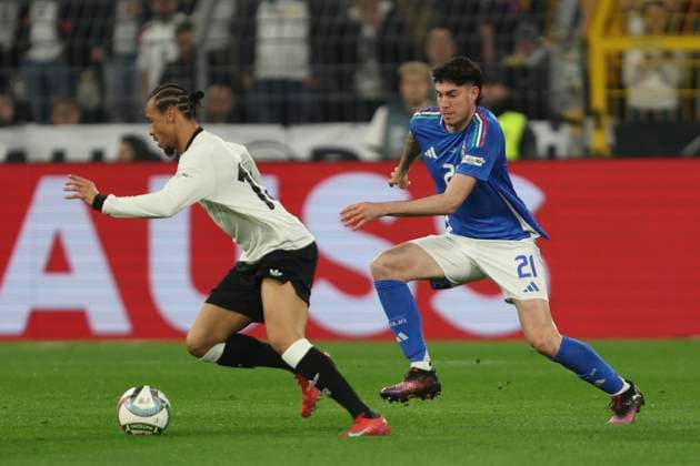 Leroy SanÃ Germany and Alessandro Bastoni Italy battle for the ball during the UEFA Nations League Quarterfinal Leg Two match between Germany and Italy at Football Stadium Dortmund on March 23, 2025 in Dortmund, Germany Photo by Oliver Kaelke DeFodi Images