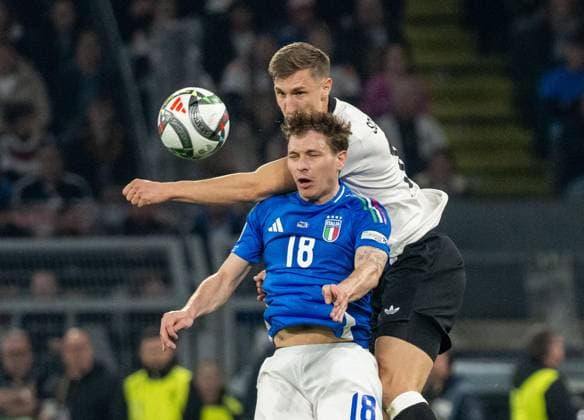 Soccer, men, 2024 25 season, UEFA Nations League quarter-final second leg in Dortmund, Germany Italy, v l Nicolo Barella Italy , Nico Schlotterbeck Germany , 23 03 2025, Copyright: xMatthiasxKochx