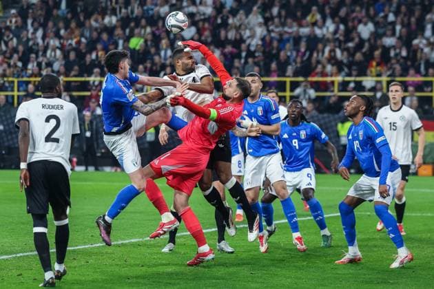 Soccer UEFA Nations League Quarterfinal Germany Italy on 23 03 2025 at Signal Iduna Park in Dortmund Jonathan Tah Germany , left Gianluigi Donnarumma Italy , right at the corner xJRx