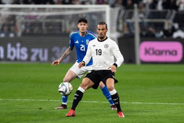 GER, Nations League, Germany vs Italy 23 03 2025, Signal Iduna Park, Dortmund, GER, Nations League, Germany vs Italy in picture duel between Leroy SanÃ Sane Germany, 19 and Alessandro Bastoni Italy ITA, 21 nordphotoxGmbHxx xChristianxSchulze nph000300