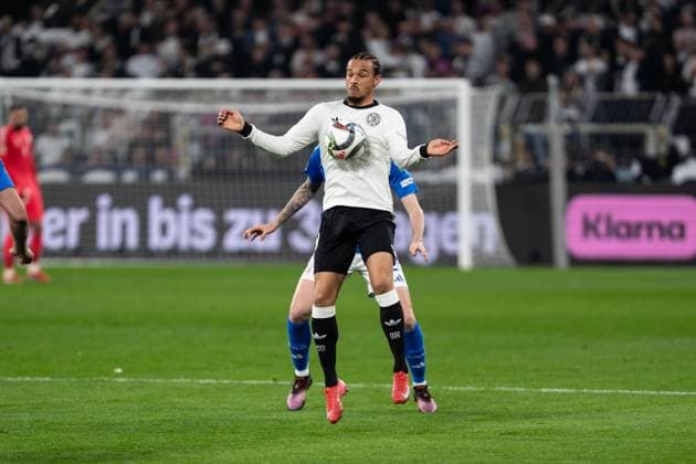 GER, Nations League, Germany vs Italy 23 03 2025, Signal Iduna Park, Dortmund, GER, Nations League, Germany vs Italy in the picture duel between Leroy SanÃ Sane Germany, 19 and Alessandro Bastoni Italy ITA, 21 takes the one with the chest nordphotoxGmbHxx xChristianxSchulze nph000300
