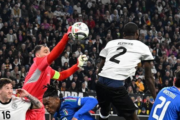 23 03 2025, xsltx, Football UEFA Nations League, Germany Italy v l Gianluigi Donnaruma Italy Antonio Rüdiger German National Football Team DFB Zweikampf, Aktion, action, battle for the ball DFL DFB REGULATIONS PROHIBIT ANY USE OF PHOTOGRAPHS as IMAGE SEQUENCES and or QUASI VIDEO Dortmund