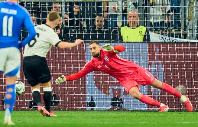 Joshua Kimmich, DFB 6 scores, shoots goal , Tor, Treffer, Torschuss, 1-0, Gianluigi Donnarumma, ITA goalkeeper 1 in the UEFA Nations League 2025 match GERMANY - ITALY in Season 2024 2025 at Mar 23, 2025 in Dortmund, Germany.