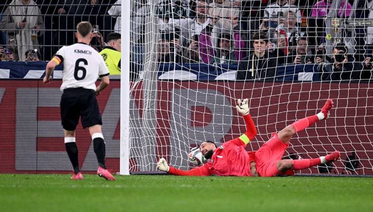 FOOTBALL UEFA Nations League 2024 2025 Quarter-final second leg in Dortmund Germany Italy 23 03 2025 Penalty goal for 1 0 by goalkeeper Joshua Kimmich left, Germany against goalkeeper Gianluigi Donnarumma right, Italy