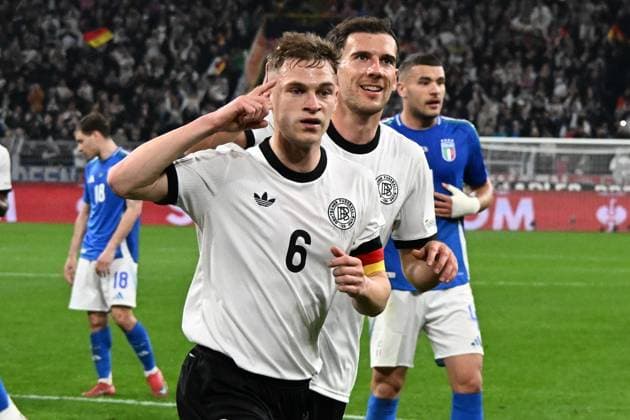 23 03 2025, xsltx, Football UEFA Nations League, Germany Italy v l Goal celebration after the goal to celebrate the goal celebrate 1 0 by Joshua Kimmich German National Football Team DFB DFL DFB REGULATIONS PROHIBIT ANY USE OF PHOTOGRAPHS as IMAGE SEQUENCES and or QUASI VIDEO Dortmund