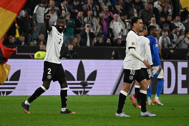 23 03 2025, xsltx, Football UEFA Nations League, Germany Italy v l Goal celebration after the goal to celebrate the goal celebrate 2 0 by Jamal Musiala German national football team DFB with Antonio Rüdiger German national football team DFB DFL DFB REGULATIONS PROHIBIT ANY USE OF PHOTOGRAPHS as IMAGE SEQUENCES and or QUASI VIDEO Dortmund