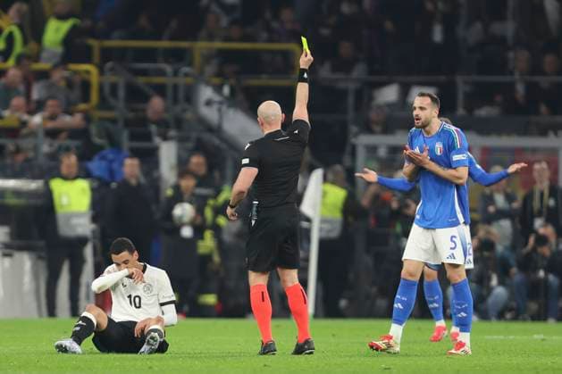 Riccardo Calafiori Italy gets the yellow card during the UEFA Nations League Quarterfinal Leg Two match between Germany and Italy at Football Stadium Dortmund on March 23, 2025 in Dortmund, Germany Photo by Oliver Kaelke DeFodi Images