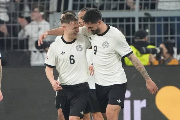 celebrate the goal, goal celebration for 3 0 Tim Kleindienst Germany Germany, 9 with Joshua Kimmich Germany Germany, 6 Dortmund 23 03 2025 Germany vs Italy, UEFA Nations League quarter-final second leg, Signal Iduna Park