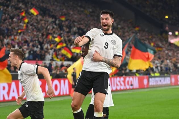 Goal celebration Tim KLEINDIENST GER with Antonio Ruediger GER after scoring 3 0, cheering,joy,enthusiasm,action lI Nico SCHLOTTERBECK GER Soccer Nations League quarterfinal Germany GER Italy ITA on 23 03 2025, Signal Iduna Park