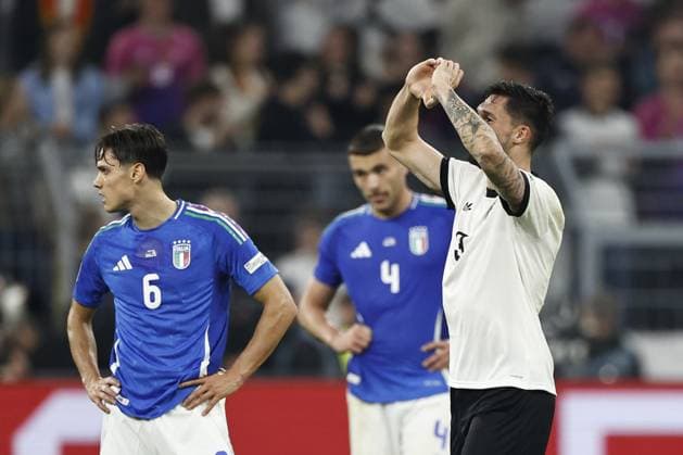 DORTMUND - (l-r) Samuele Ricci of Italy balks, Tim Kleindienst of Germany celebrates the 3-0 during the UEFA Nations League quarterfinal match between Germany and Italy at the BVB Stadion Dortmund on March 23, 2025 in Dortmund, Germany. ANP Hollandse Hoogte MAURICE VAN STEEN UEFA Nations League Quarterfinal Leg Two 2025 xVIxANPxSportx xMauricexvanxSteenxIVx 522969699 originalFilename: 522969699.jpg