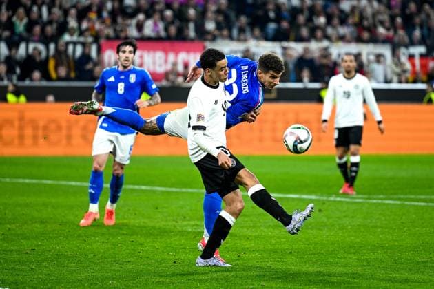 Giovanni Di Lorenzo Italy 22 in duel with Jamal Musiala Germany, 10 , GER, Germany GER vs Italy ITA , Football, UEFA Nations League Quarterfinal Round 2, 23 03 2025 GER, Germany GER vs Italy ITA , Football Laenderspiel, UEFA Nations League Quarterfinal Round2, 2024 2025, 23 03 2025 Dortmund Copyright: xEibner-Pressefoto FlorianxWiegandx EP_FWD