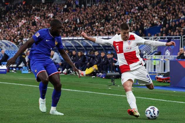 FOOTBALL : France Vs Croatie - Ligue des Nations - 23 03 2025 Andrej Kramaric (Croatie) vs Dayot Upamecano (France) ParisFrance  Copyright: xMichtofx