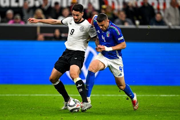 Tim Kleindienst Germany, 09 in duel with Alessandro Buongiorno Italy 04 , GER, Germany GER vs Italy ITA , Soccer, UEFA Nations League Quarterfinal Round 2, 23 03 2025 GER, Germany GER vs Italy ITA , Soccer Laenderspiel, UEFA Nations League Quarterfinal Round2, 2024 2025, 23 03 2025 Dortmund Copyright: xEibner-Pressefoto FlorianxWiegandx EP_FWD