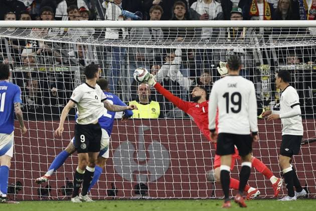 DORTMUND - (l-r) Tim Kleindienst of Germany scores 3-0, Giovanni Di Lorenzo, Italy goalkeeper Gianluigi Donnarumma of Italy during the UEFA Nations League quarterfinal match between Germany and Italy at the BVB Stadium Dortmund on March 23, 2025 in Dortmund, Germany. ANP Hollandse Hoogte MAURICE VAN STEEN UEFA Nations League Quarterfinal Leg Two 2025 xVIxANPxSportx xMauricexvanxSteenxIVx 522970823 originalFilename: 522970823.jpg
