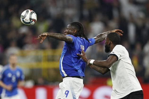 DORTMUND - (l-r) Moise Kean of Italy, Antonio Rudiger of Germany during the UEFA Nations League quarterfinal match between Germany and Italy at the BVB Stadion Dortmund on March 23, 2025 in Dortmund, Germany. ANP Hollandse Hoogte MAURICE VAN STEEN UEFA Nations League Quarterfinal Leg Two 2025 xVIxANPxSportx xMauricexvanxSteenxIVx 522971361 originalFilename: 522971361.jpg