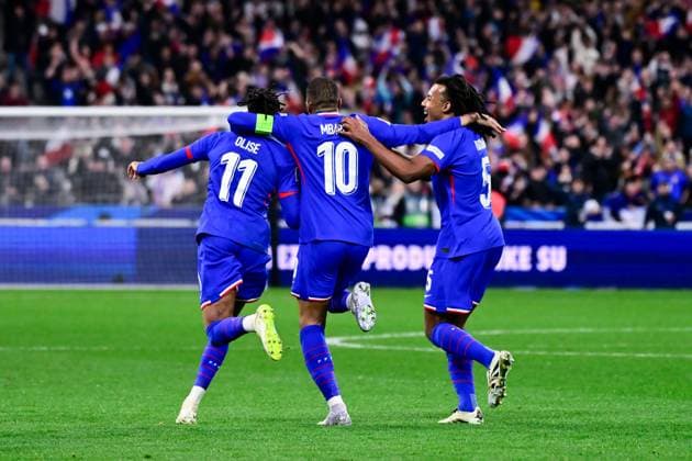 FOOTBALL : France vs Croatie - Ligue des Nations - 23 03 2025 Michael Olise ( 11 - France ) celebrates with Kylian Mbappe ( 10 - France ) and Jules Kounde ( 5 - France ) during the UEFA Nations League match between France and Croatia at Stade de France on March 23, 2025 in Paris, France. ( Photo by Dante Badano PsnewZ ) - ParisFrance  Copyright: xDantexBadanox