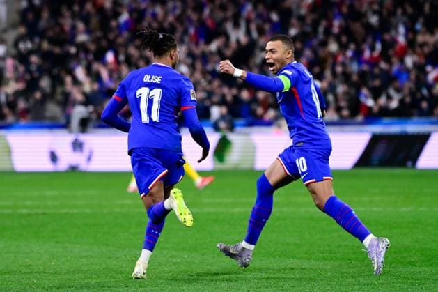 FOOTBALL : France vs Croatie - Ligue des Nations - 23 03 2025 Michael Olise ( 11 - France ) celebrates with Kylian Mbappe ( 10 - France ) during the UEFA Nations League match between France and Croatia at Stade de France on March 23, 2025 in Paris, France. ( Photo by Dante Badano PsnewZ ) - ParisFrance  Copyright: xDantexBadanox