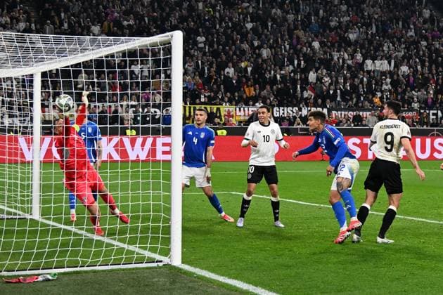 23 03 2025, xsltx, Football UEFA Nations League, Germany Italy v l Gianluigi Donnaruma Italy Tim Kleindienst Deutsche Fussball Nationalmannschaft DFB Torschuetze, erzielt das Tor, Treffer, scores the goal 3 0 DFL DFB REGULATIONS PROHIBIT ANY USE OF PHOTOGRAPHS as IMAGE SEQUENCES and or QUASI VIDEO Dortmund