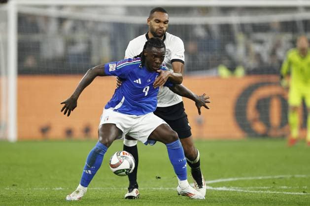 DORTMUND - (l-r) Jonathan Tah of Germany, Moise Kean of Italy during the UEFA Nations League quarterfinal match between Germany and Italy at the BVB Stadion Dortmund on March 23, 2025 in Dortmund, Germany. ANP Hollandse Hoogte MAURICE VAN STEEN UEFA Nations League Quarterfinal Leg Two 2025 xVIxANPxSportx xMauricexvanxSteenxIVx 522973597 originalFilename: 522973597.jpg