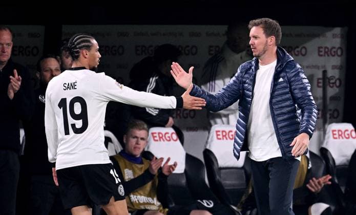 FOOTBALL UEFA Nations League 2024 2025 Quarter-final second leg in Dortmund Germany Italy 23 03 2025 Substitution of Leroy Sane left, Germany claps with national coach Julian Nagelsmann right, Germany