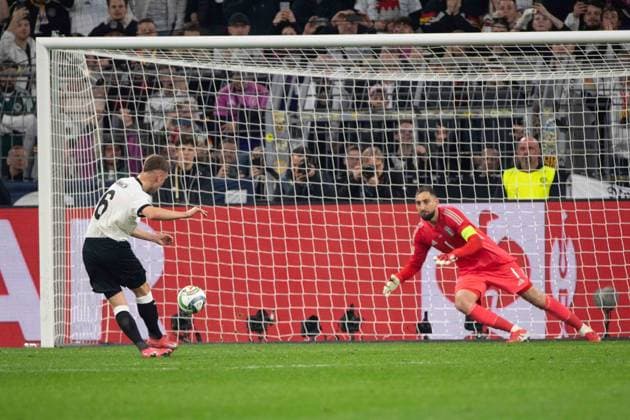 Joshua KIMMICH GER scores from the penalty spot to make it 1-0,, against goalkeeper Gianluigi DONNARUMMA ITA Football UEFA Nations League Quarter Final, Round of 8, Germany GER Italy ITA on 23 03 2024 at Signal Iduna Park Dortmund,