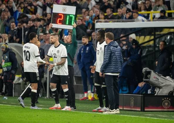 Soccer, Men, Season 2024 25, UEFA Nations League quarter-final second leg in Dortmund, Germany Italy, f l Jamal Musiala Germany , Robert Andrich Germany , Yann Aurel Bisseck Germany , Coach Julian Nagelsmann Germany , 23 03 2025, Copyright: xMatthiasxKochx