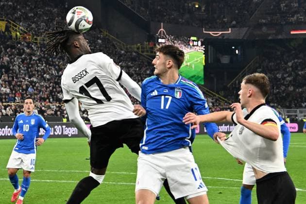 23 03 2025, xsltx, Football UEFA Nations League, Germany Italy v l Yann Aurel Bisseck German National Football Team DFB Matteo Ruggeri Italy duel, action, action, battle for the ball Joshua Kimmich German National Football Team DFB DFL DFB REGULATIONS PROHIBIT ANY USE OF PHOTOGRAPHS as IMAGE SEQUENCES and or QUASI VIDEO Dortmund