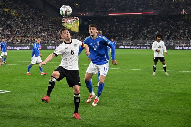 23 03 2025, xsltx, Football UEFA Nations League, Germany Italy v l Joshua Kimmich German National Football Team DFB Matteo Ruggeri Italy duel, action, action, battle for the ball DFL DFB REGULATIONS PROHIBIT ANY USE OF PHOTOGRAPHS as IMAGE SEQUENCES and or QUASI VIDEO Dortmund