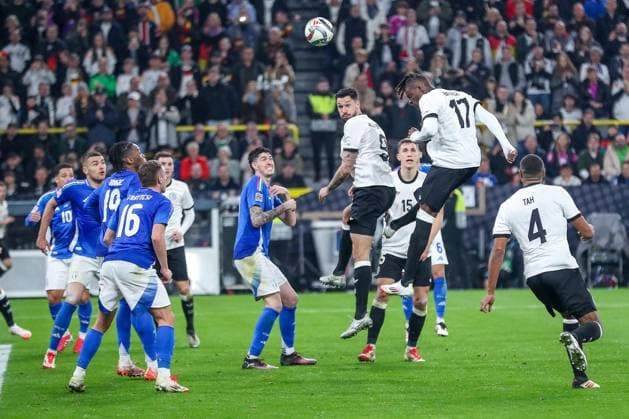 23 03 2025, Football, Quarter-final UEFA Nations League, Germany Italy, Signal Iduna Park, Season 2024 2025 Penalty area action header Tim Kleindienst GER 09 Yann Aurel Bisseck GER 17 DFB regulations prohibit any use of photographs as image sequences and or quasi video Nordrhein Westfalen Germany