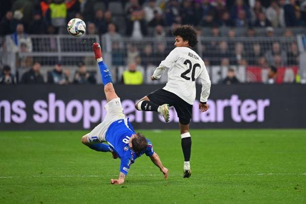Karim ADEYEMI GER , action,duel against Nicolo BARELLA ITA Soccer Nations League quarterfinal Germany GER Italy ITA 3 3 on 23 03 2025, Signal Iduna Park