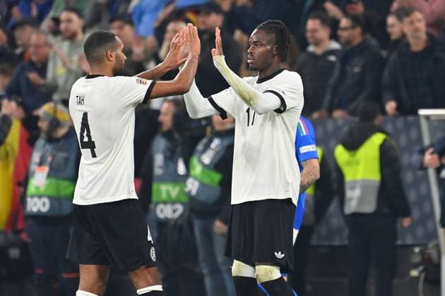 Final cheer v re Yann BISSECK GER , Jonathan Tah GER action, Soccer Nations League quarterfinal Germany GER Italy ITA 3 3 on 23 03 2025, Signal Iduna Park