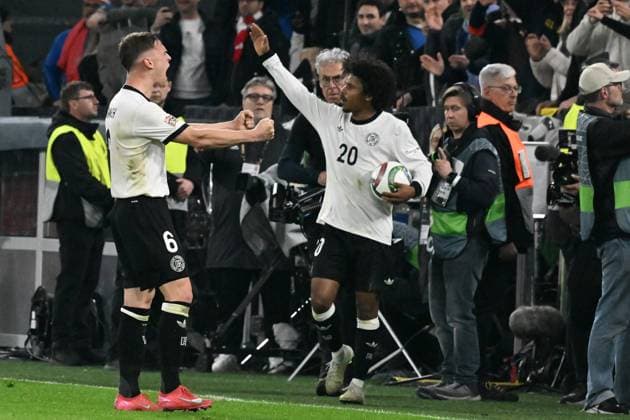 23 03 2025, xsltx, Soccer UEFA Nations League, Germany Italy v l Cheers, joy of victory Joshua Kimmich German National Football Team DFB Karim Adeyemi German National Football Team DFB DFL DFB REGULATIONS PROHIBIT ANY USE OF PHOTOGRAPHS as IMAGE SEQUENCES and or QUASI VIDEO Dortmund