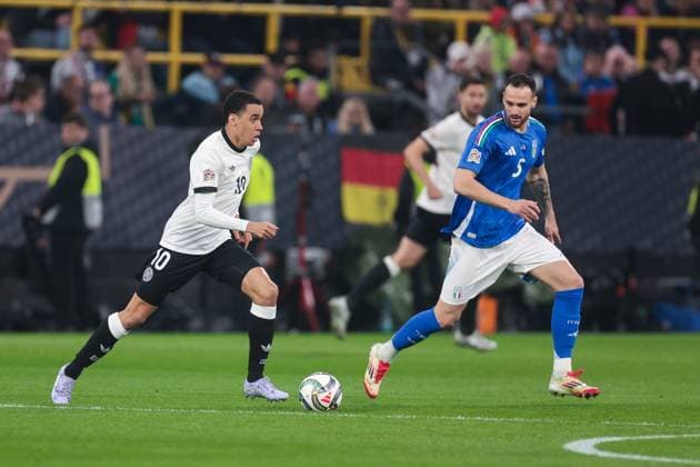 22 03 2025, UEFA Nations League, quarter-final, second leg, Germany Italy, f l Jamal Musiala Germany , Riccardo Calafiori Italy , Dortmund Signal Iduna Park NRW Germany xRHR PHOTO DEx Copyright: DennisxEwert RHR-FOTOx RHR-FOTO DE