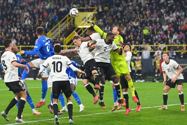 Penalty area scene with goalkeeper Oliver BAUMANN GER ,Antonio Ruediger GER ,Jonathan Tah GER ,Joshua KIMMICH GER ,Action Soccer Nations League Quarter Final Germany GER Italy ITA 3 3 on 23 03 2025, Signal Iduna Park