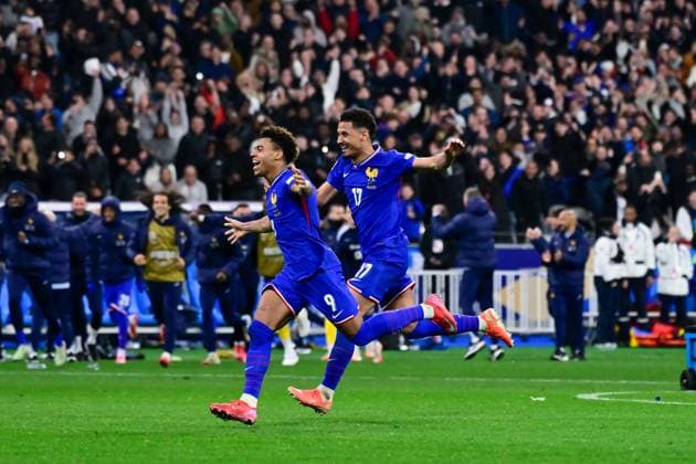 FOOTBALL : France vs Croatie - Ligue des Nations - 23 03 2025 Desire Doue ( 9 - France ) and William Saliba ( 17 - France ) celebrate their side s victory after the UEFA Nations League match between France and Croatia at Stade de France on March 23, 2025 in Paris, France. ( Photo by Dante Badano PsnewZ ) - ParisFrance  Copyright: xDantexBadanox