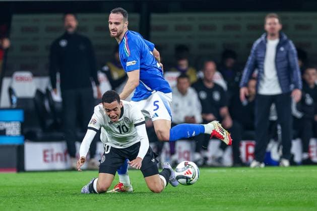 23 03 2025, Football, Quarter-final UEFA Nations League, Germany Italy, Signal Iduna Park, Season 2024 2025 Jamal Musiala GER 10 in duel against Federico Gatti ITA 05 DFB regulations prohibit any use of photographs as image sequences and or quasi video Nordrhein Westfalen Germany