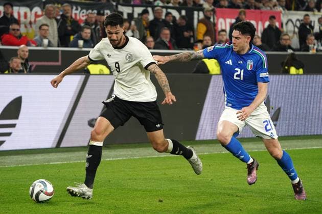 Mens national team, Football, Nations League, 23 03 2025, Signaliduna Park, Dortmund Germany vs Italy , Tim Kleindienst, Germany, Alessandro Bastoni, Italy,