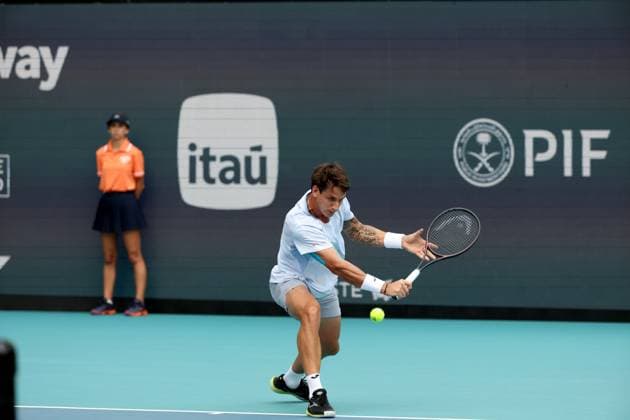 March 23, 2025, Miami Gardens, Florida, United States Of America: MIAMI GARDENS, FLORIDA - MARCH 23: Novak Djokovic of Serbia defeats Camilo Ugo Carabelli of Argentina during Day 6 of the Miami Open at Hard Rock Stadium on March 23, 2025 in Miami Gardens, Floriida...People: Camilo Ugo Carabelli Miami Gardens United States Of America - ZUMAs214 20250323_ada_s214_036 Copyright: xSMGx