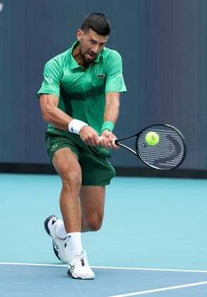 March 23, 2025, Miami Gardens, Florida, United States Of America: MIAMI GARDENS, FLORIDA - MARCH 23: Novak Djokovic of Serbia defeats Camilo Ugo Carabelli of Argentina during Day 6 of the Miami Open at Hard Rock Stadium on March 23, 2025 in Miami Gardens, Floriida...People: Novak Djokovic Miami Open 2025 - Day 6  - ZUMAs214 20250323_ada_s214_052 Copyright: xSMGx