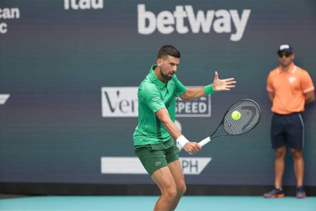 March 23, 2025, Miami Gardens, Florida, United States Of America: MIAMI GARDENS, FLORIDA - MARCH 23: Novak Djokovic of Serbia defeats Camilo Ugo Carabelli of Argentina during Day 6 of the Miami Open at Hard Rock Stadium on March 23, 2025 in Miami Gardens, Floriida...People: Novak Djokovic Miami Open 2025 - Day 6  - ZUMAs214 20250323_ada_s214_058 Copyright: xSMGx
