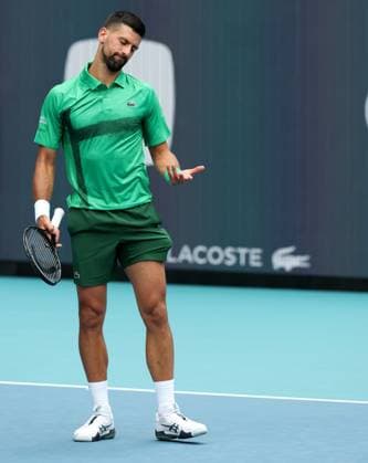 March 23, 2025, Miami Gardens, Florida, United States Of America: MIAMI GARDENS, FLORIDA - MARCH 23: Novak Djokovic of Serbia defeats Camilo Ugo Carabelli of Argentina during Day 6 of the Miami Open at Hard Rock Stadium on March 23, 2025 in Miami Gardens, Floriida...People: Novak Djokovic Miami Open 2025 - Day 6  - ZUMAs214 20250323_ada_s214_108 Copyright: xSMGx