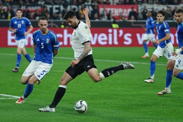 UEFA Nations League 24 25 Germany Italy on 23 03 2025 at Signal Iduna Park in Dortmund Tim Kleindienst Germany 9 vs Federico Gatti Italy 5 MH