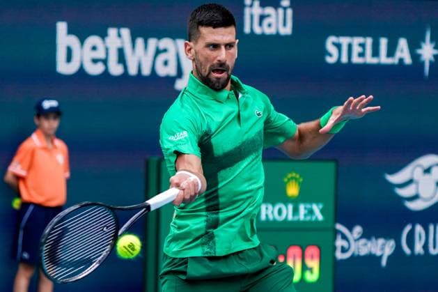 March 23, 2025, Miami, Florida, USA: Novak Djokovic (SRB) returns a shot to Camilo Ugo Carabelli (not pictured) during the men s singles third round match at the 2025 Miami Open presented by Itau at Hard Rock Stadium. Miami USA - ZUMAw109 20250323_fap_w109_065 Copyright: xDebbyxWongx
