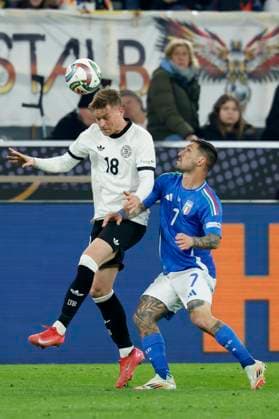 in the picture from l Maximilian Mittelstaedt Germany, 18 and Matteo Politano Italy, 7 , 23 03 2025, Soccer, UEFA Nations League, Quarterfinal, Germany Italy, GER, Dortmund, Signal Iduna Park, Copyright: HMBxMedia xHeikoxBecker