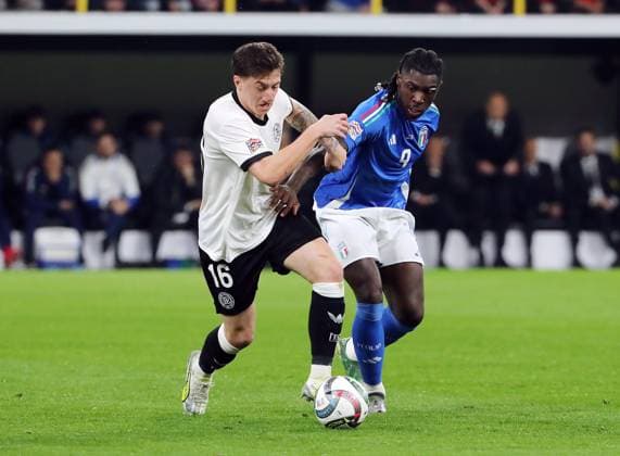 Angelo Stiller in a duel with Moise Kean Action Match scene Sport Football Soccer Nations League International match National team DFB Men Season 2024 2025 23 03 2025 Germany GER vs Italy ITA DFL regulations prohibit any use of photographs as image sequences and or quasi video
